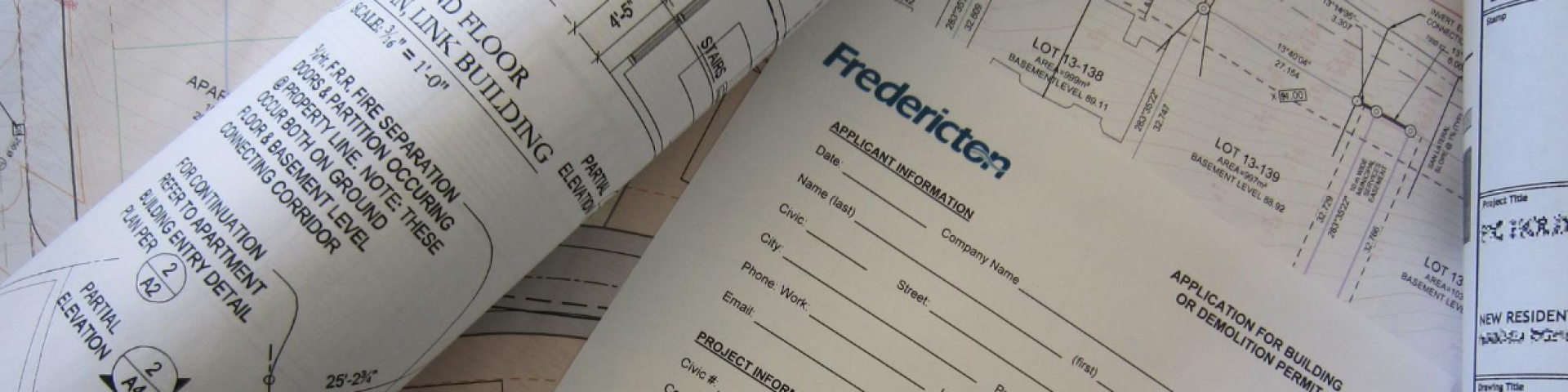 Assortment of official documents spread out on a table.